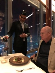 Jimmy enjoys an excellent wine at At.mosphere, Burj Khalifa.