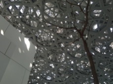 Close up of the interior of the dome at the Louvre Abu Dhabi.